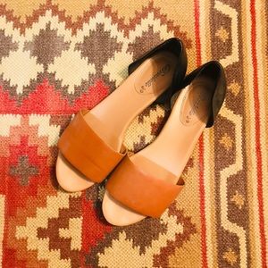 Black and brown flats